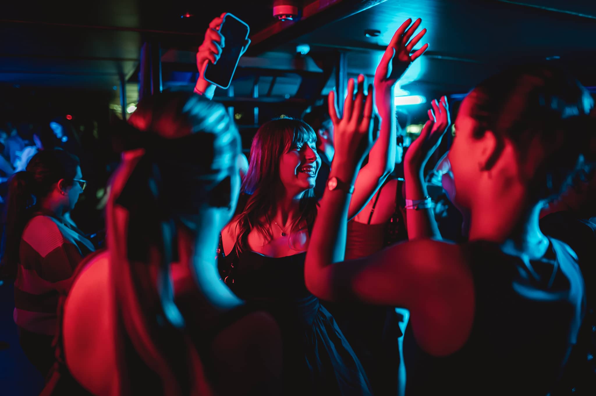 PArty with people putting up their hands